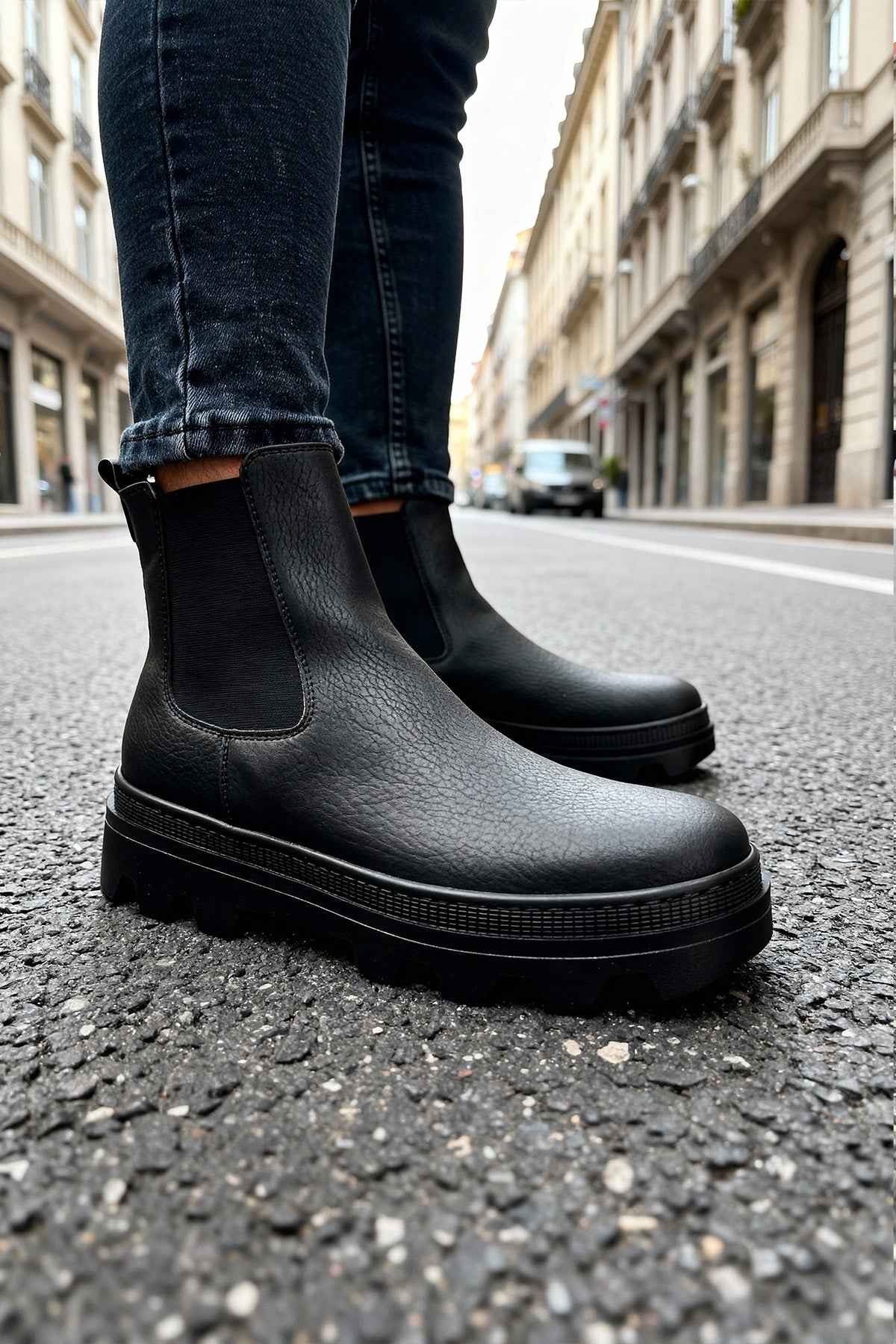 Men's black Chelsea boots with elastic side panels and chunky sole
