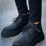 Men's black lace-up casual boots with round toe and thick rubber sole