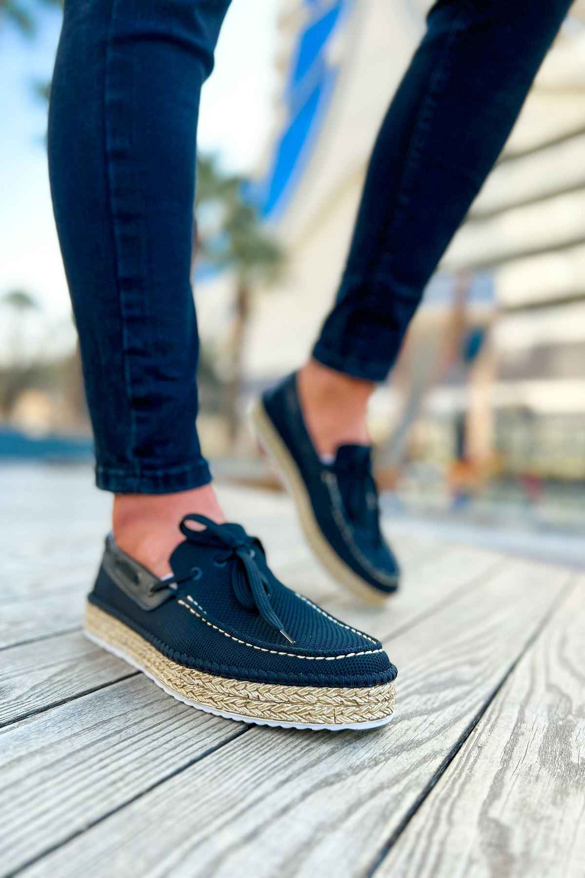 Men's espadrille shoes, dark canvas side profile with lace-up ties and jute rope sole