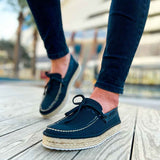 Men's espadrille shoes with dark canvas uppers, lace-up closure, and jute rope sole