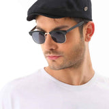 Men's black flat cap with small side logo button