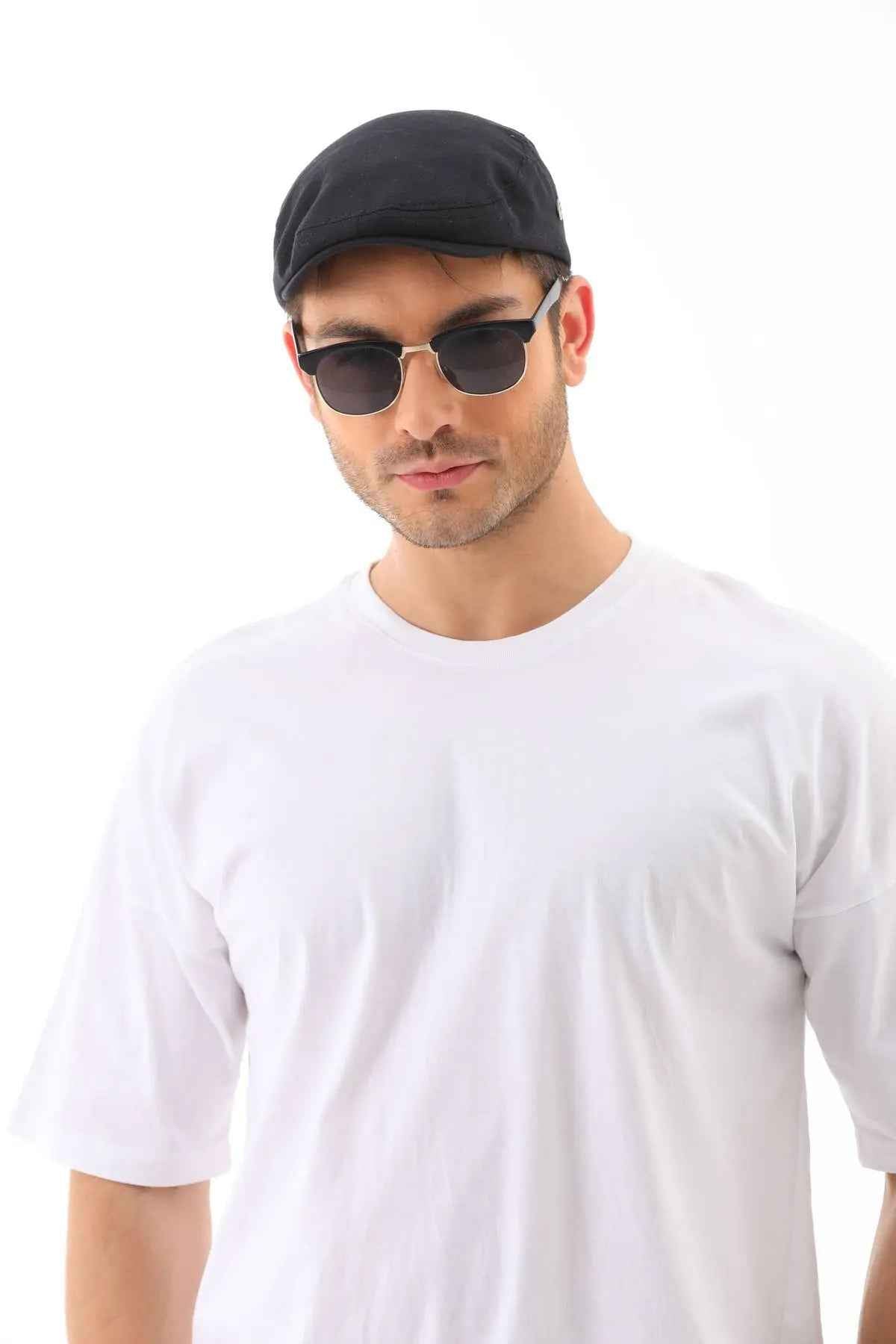 Men's black flat cap with subtle panel stitching