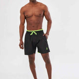 Men's black swimming shorts with neon green drawstring waistband and small side logo