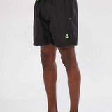 Men's black swim shorts with neon green trim and anchor logo on leg