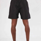 Men's black swim shorts with neon green waistband and back view