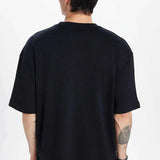 Men's oversize black crew-neck T-shirt, back view with short sleeves