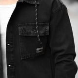 Black denim jacket with chest pocket and stitched detailing, sherpa-lined collar