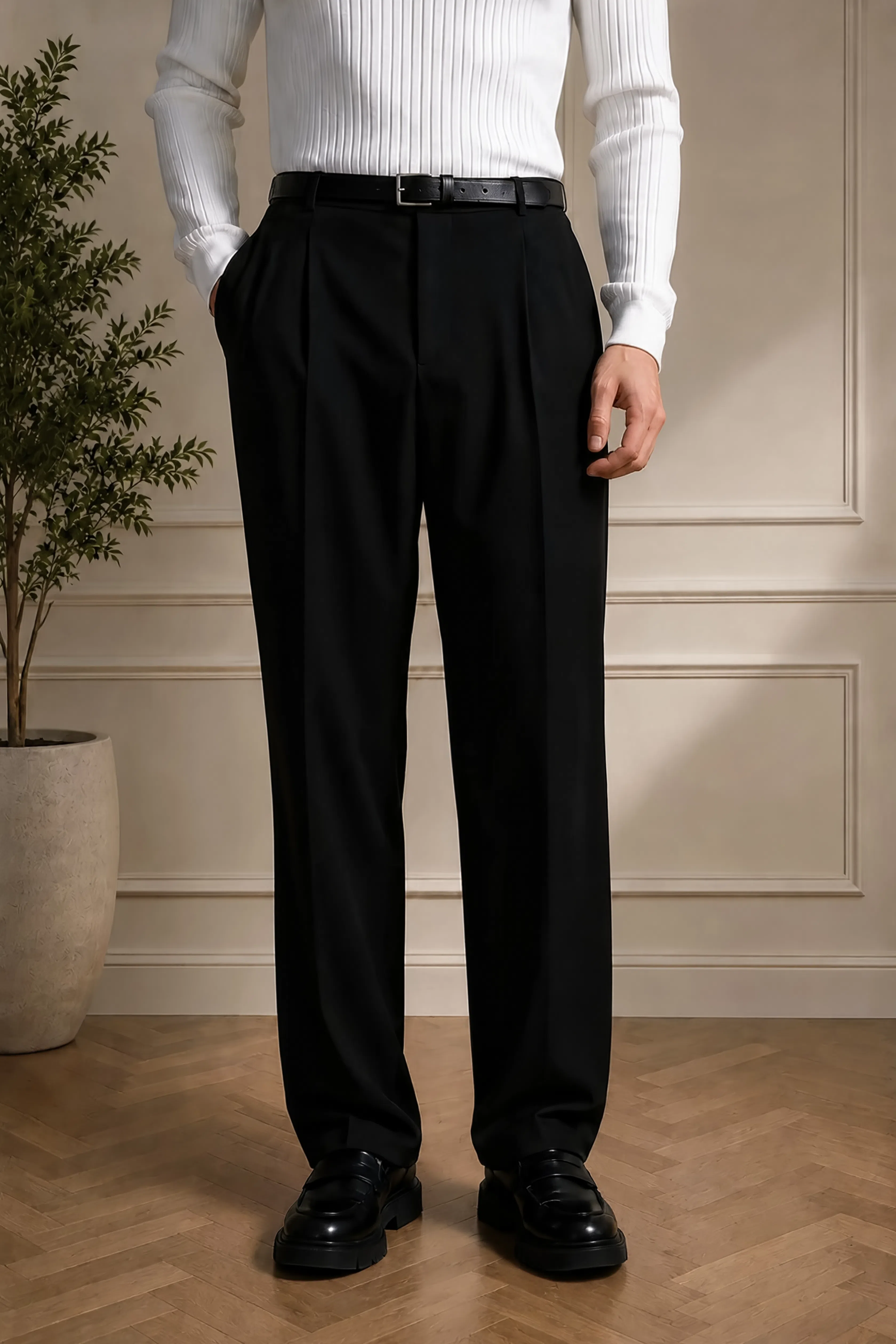 Men's black dress pants front view with pleats and black belt