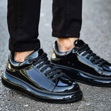Men's black patent leather sneakers, side profile with lace-up eyelets