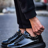 Apollo men's black patent leather sneakers, side view, glossy toe and lace-up
