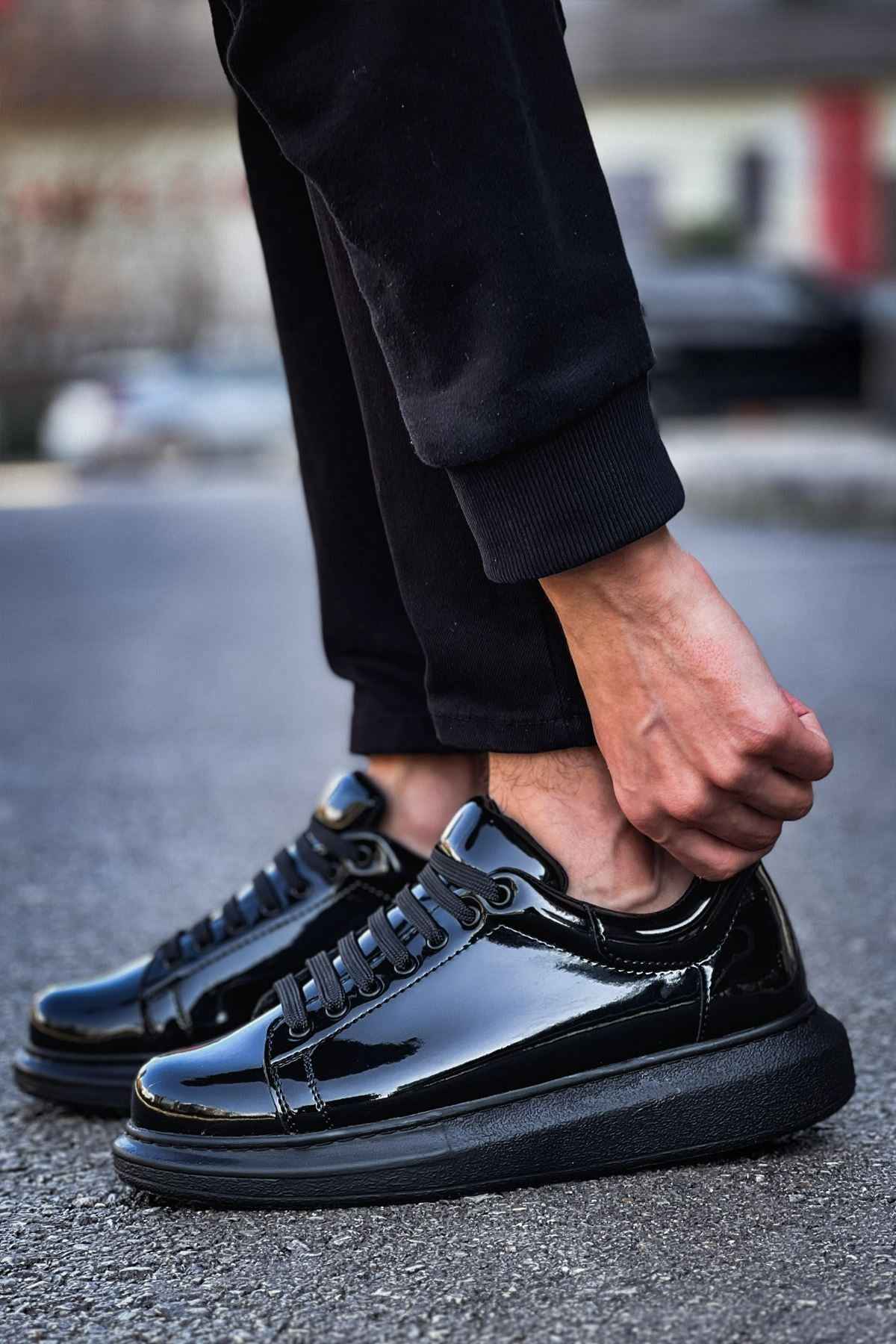 Apollo men's black patent leather sneakers, side view, glossy toe and lace-up