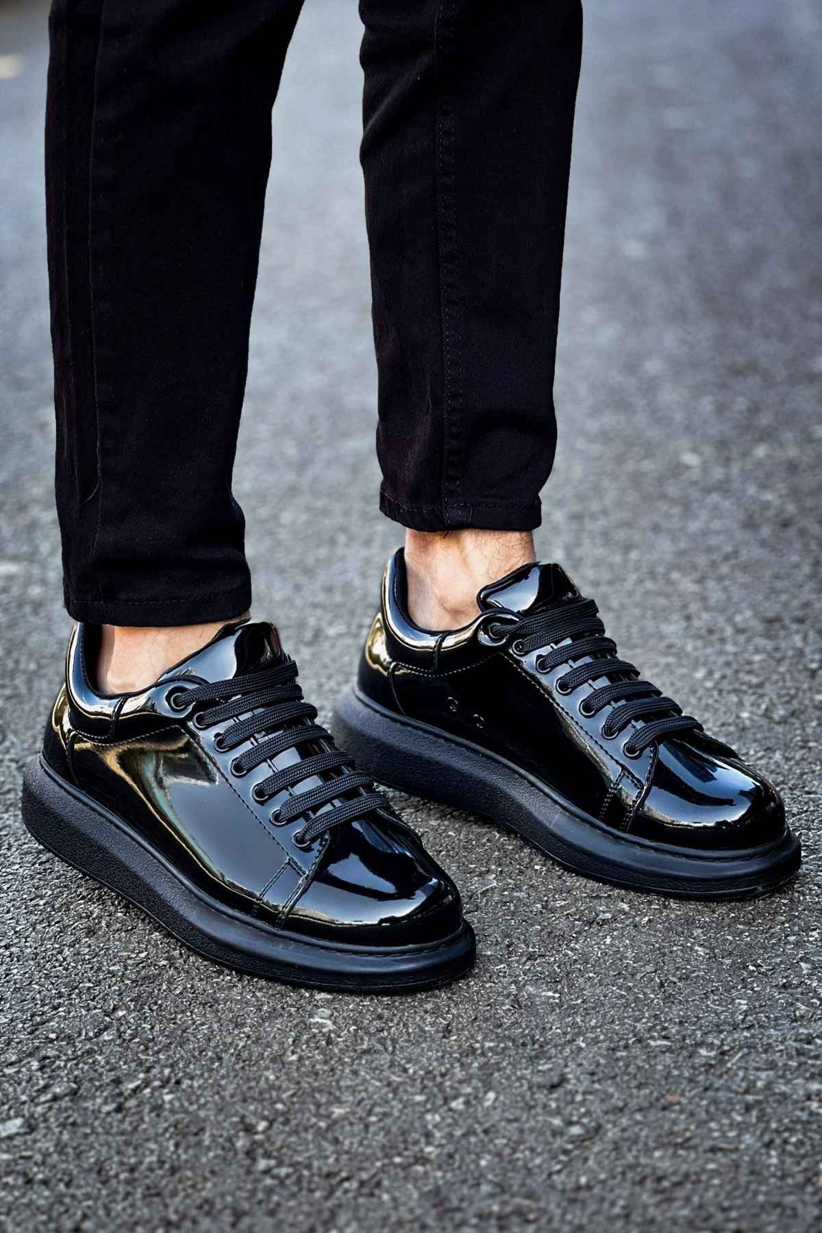 Apollo men's black patent leather sneakers, front three-quarter view, thick sole