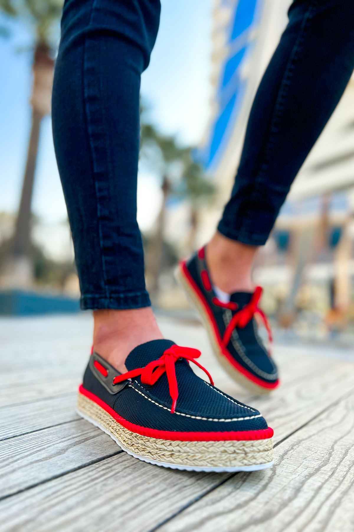 Men's espadrille loafers with red lace-up ties, dark upper, and jute-wrapped sole