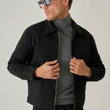 Men's black jacket with zip front, stand collar, and two side pockets