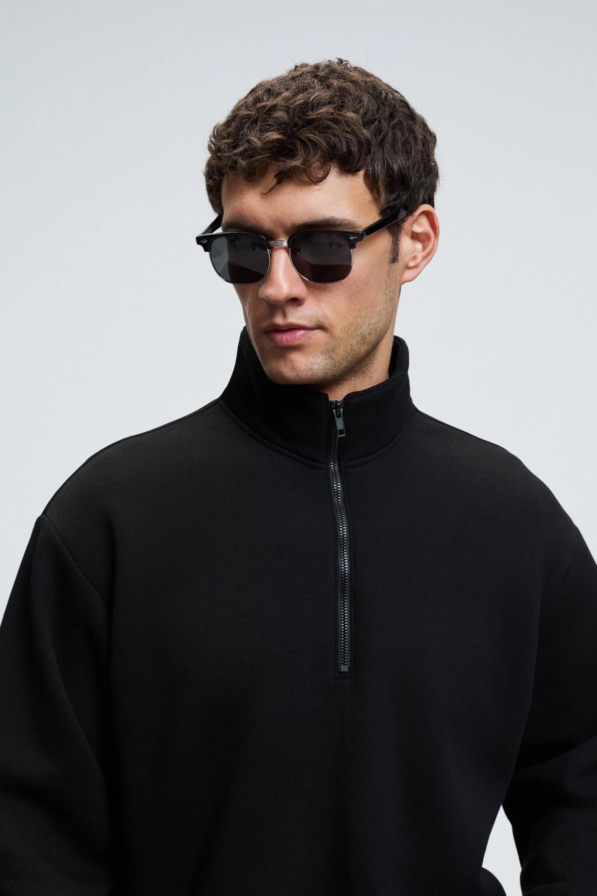 Black zip stand-collar sweatshirt with half-zip front detail