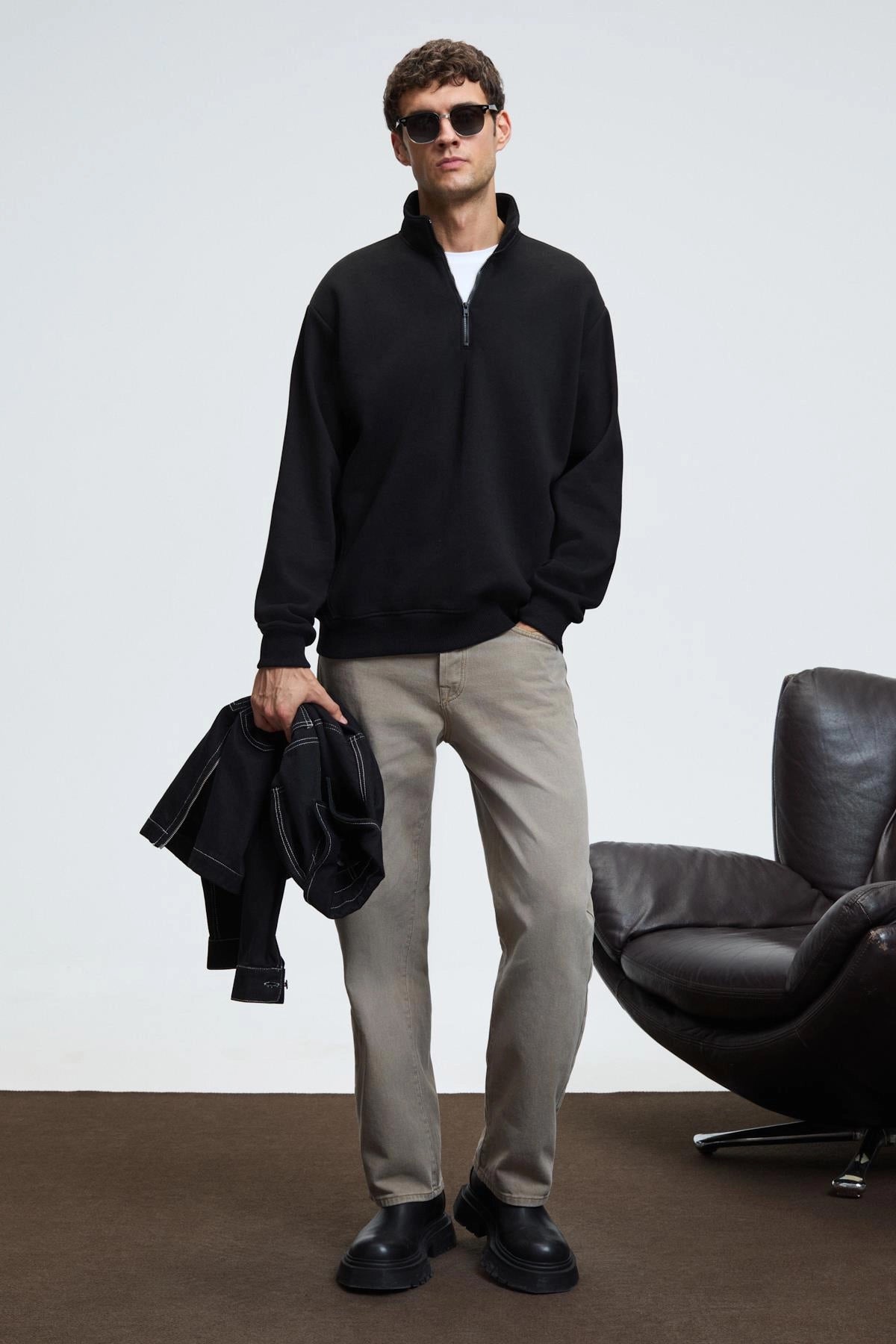 Black zip stand-collar sweatshirt with ribbed cuffs, front view