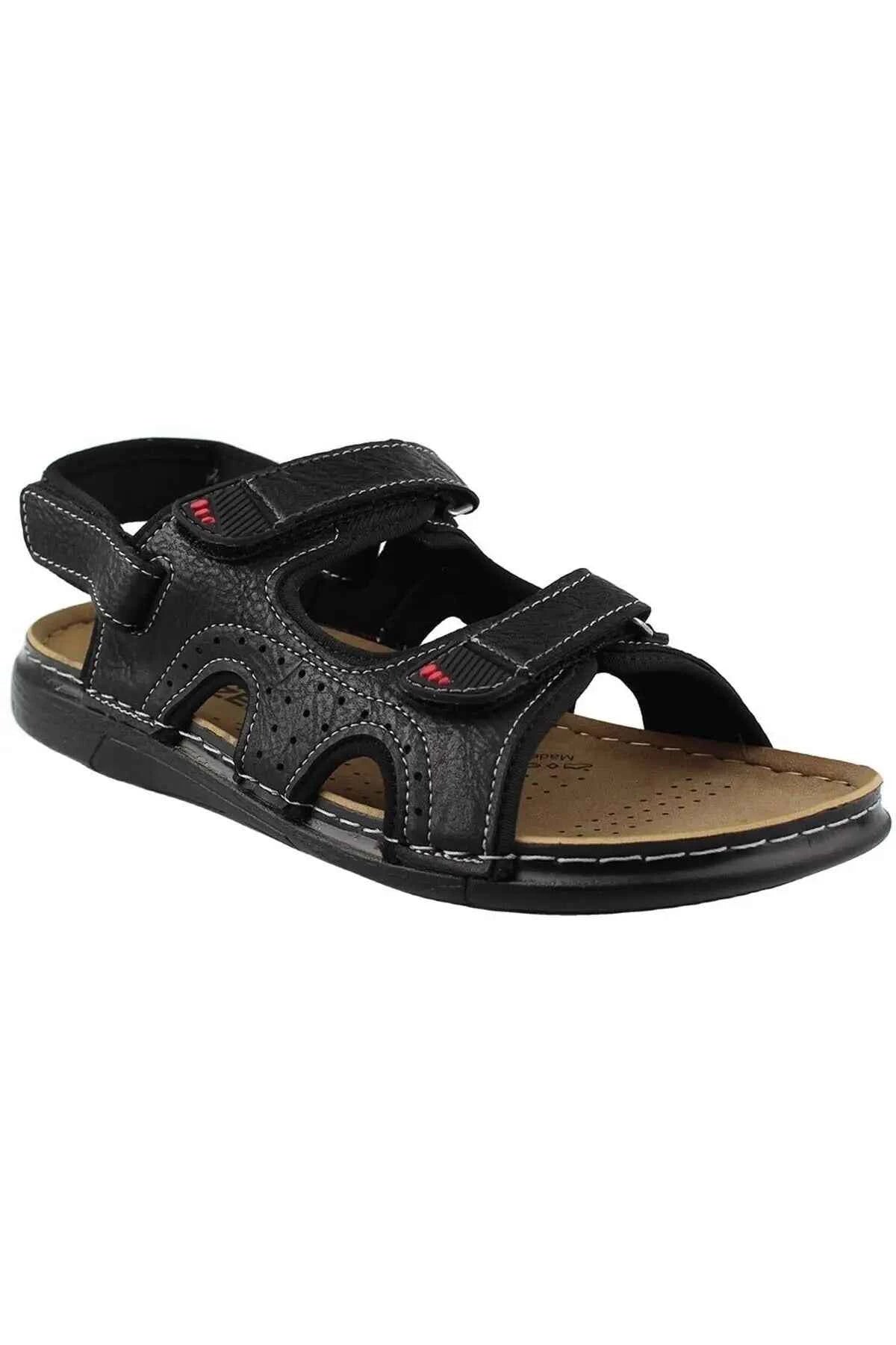 Black slide sandals with textured upper, side cutouts, and double hook-and-loop straps
