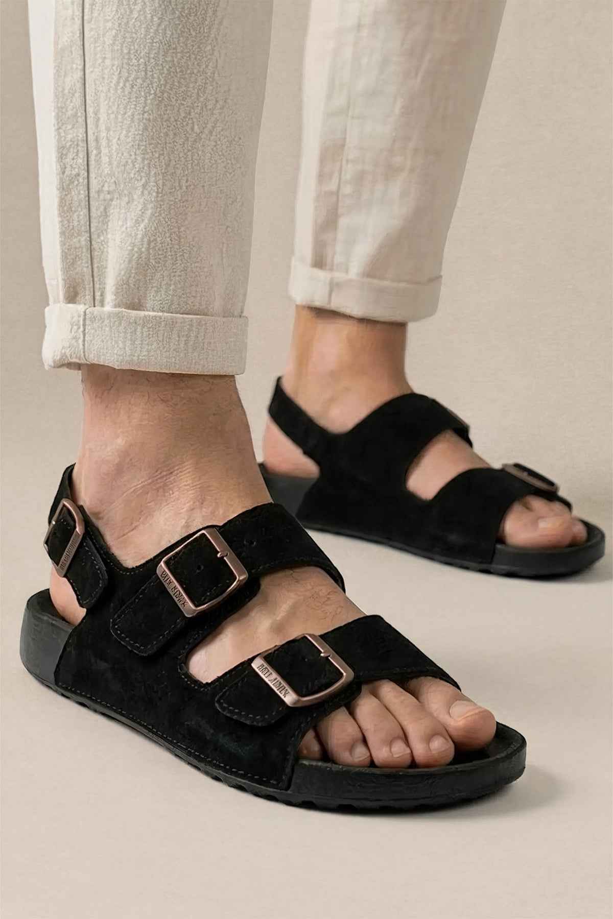 Men's black sandals with two adjustable buckle straps and open toe