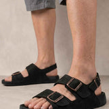 Men's black sandals with two buckle-strap bands and open toe, side view