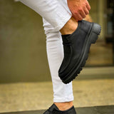 Men's black lace-up shoes with thick tread sole, heel and side detail