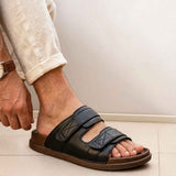 Men's black RX slide sandals, two-cross strap over foot with textured sole