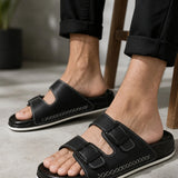 Men's black open-toe slippers with two adjustable straps and flat outsole