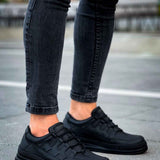 Men's black sneakers, pair shown side-by-side with lace-up design and low sole
