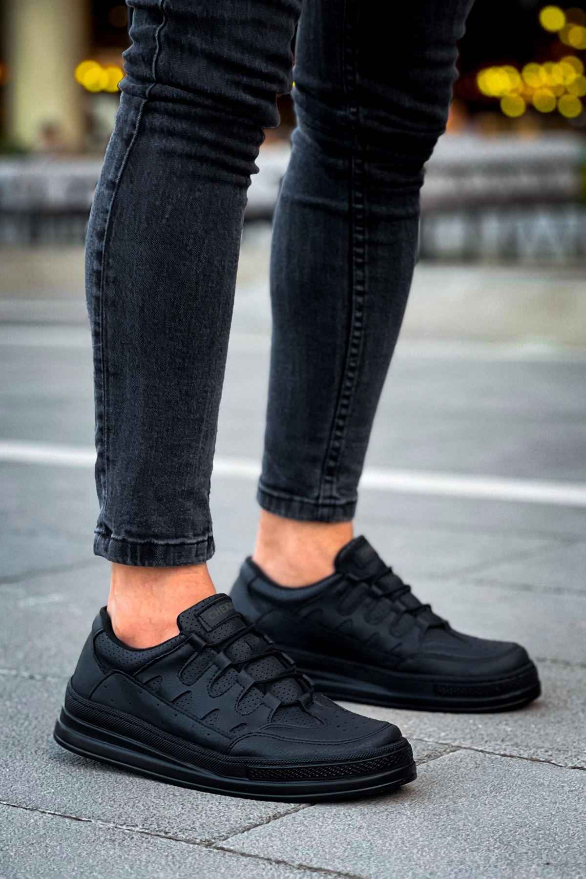 Men's black sneakers, pair shown side-by-side with lace-up design and low sole