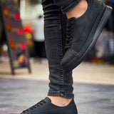 Men's black low-top sneakers, lace-up with cushioned collar and rubber outsole