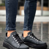 Men's black lace-up sneakers with chunky tread platform sole, side view