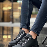 Men's black lace-up sneakers on chunky platform sole, side view