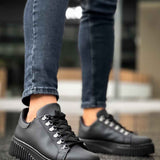 Men's black lace-up sneakers with platform sole, front three-quarter view