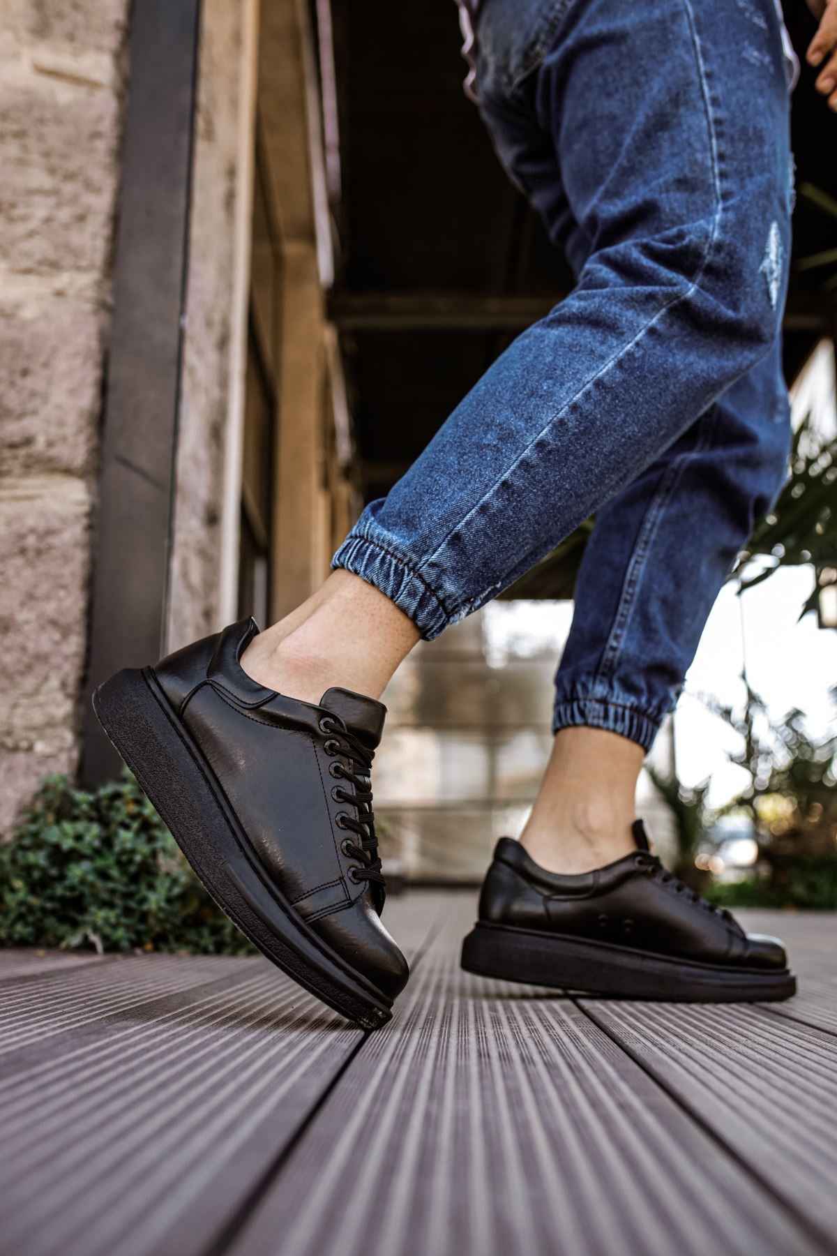 Men's black lace-up sneakers with chunky rubber sole