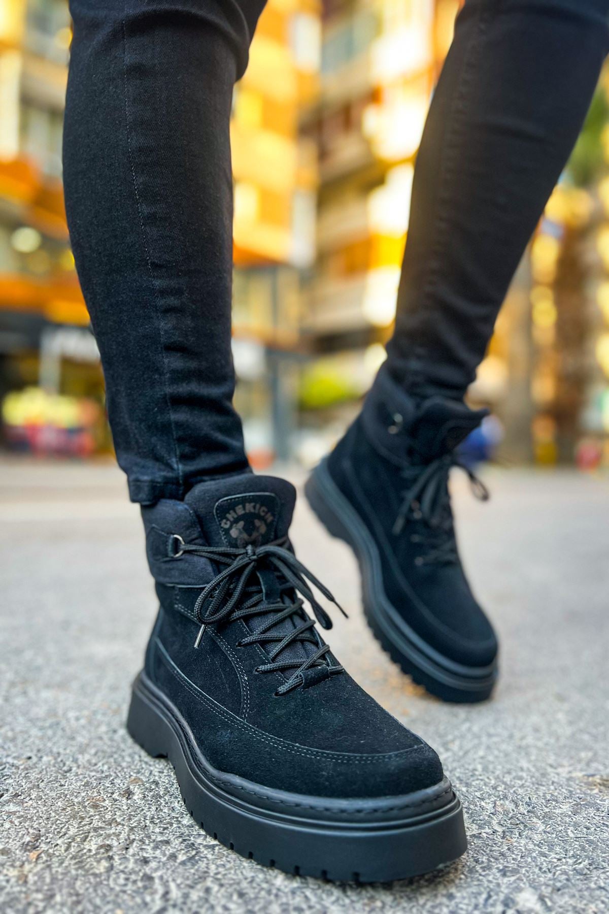 Men's black suede ankle boots with lace-up front and platform sole