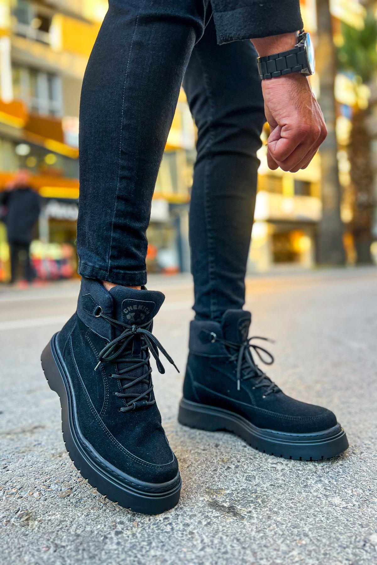 Men's dark suede lace-up ankle boots with ankle strap tab and thick sole