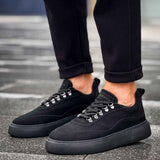 Black suede lace-up sneakers with padded collar and lace front