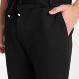 Kaphone men's black sweatpants close-up of elastic waistband and drawstring