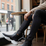 Men's black ankle boots with white thick sole and elastic gore