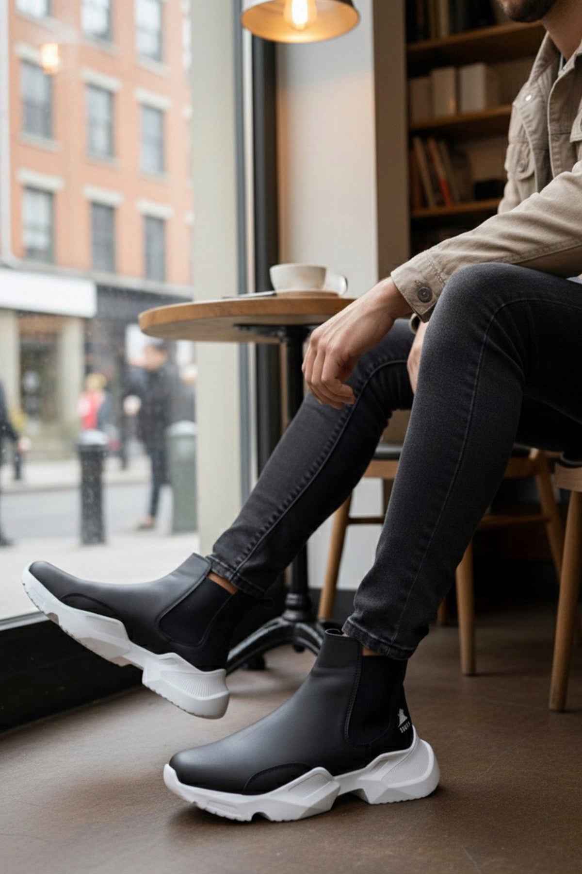 Men's black ankle boots with white thick sole and elastic gore