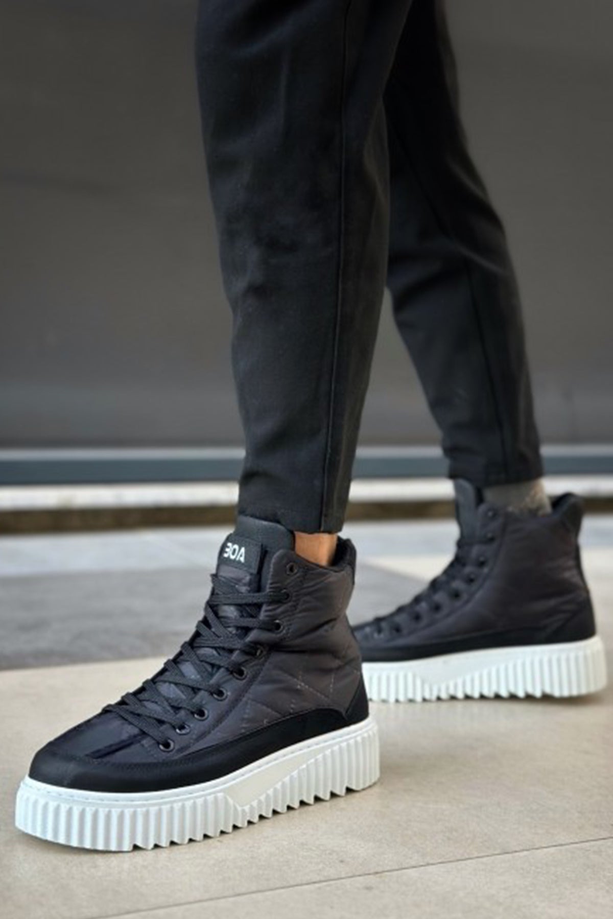 Men's black lace-up boots with white midsole platform