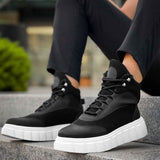 Men's black lace-up boots with white chunky sole and side panels