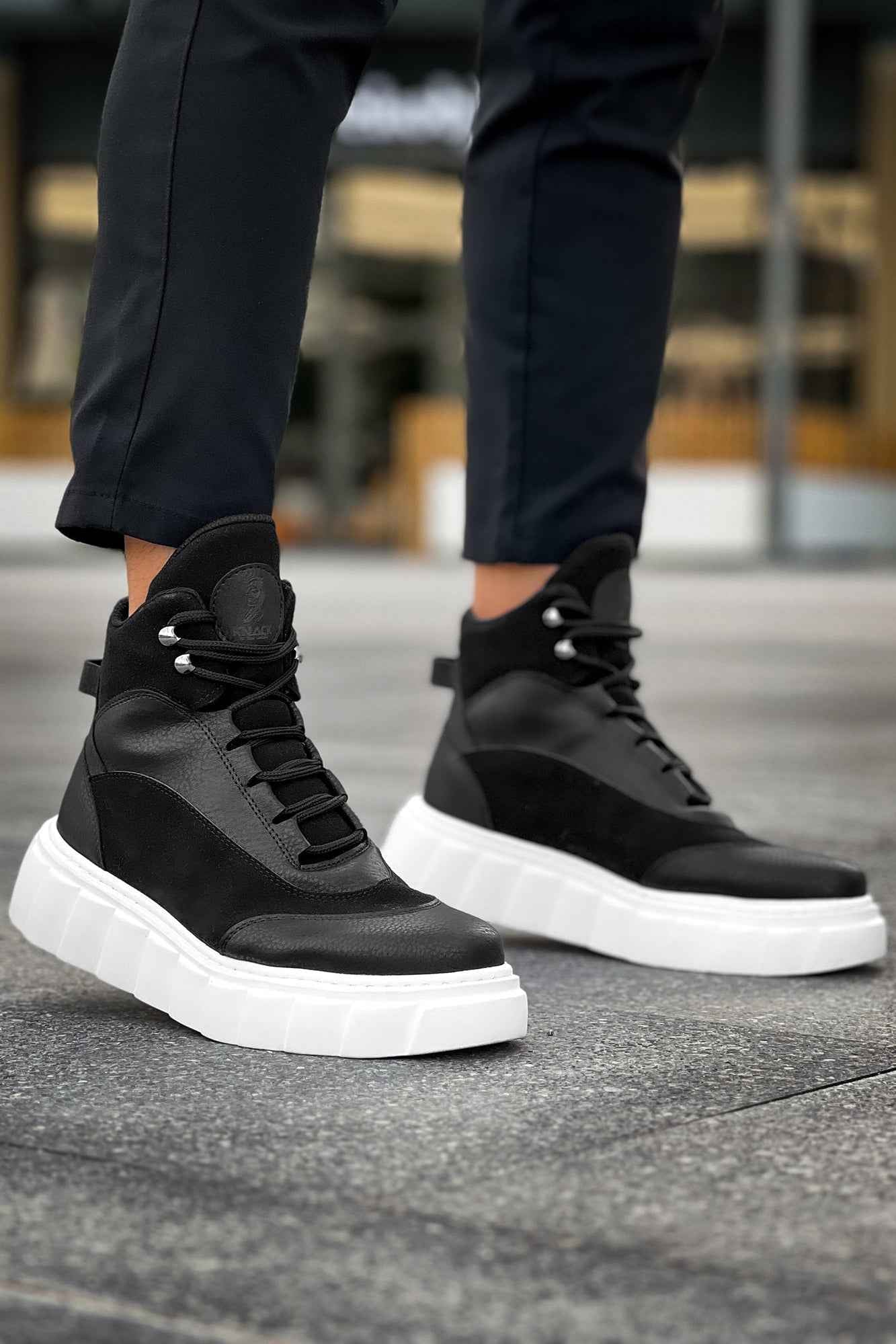 Men's black lace-up ankle boots with white platform sole