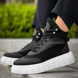 Men's black lace-up boots with white chunky sole and lace-up detail