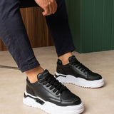 Black low-top sneakers with black laces and white midsole stripe