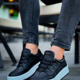 Men's black lace-up sneakers with white sidewall sole and strap detail