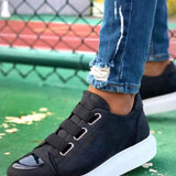 Black men's sneakers with hook-and-loop straps and white rubber sole