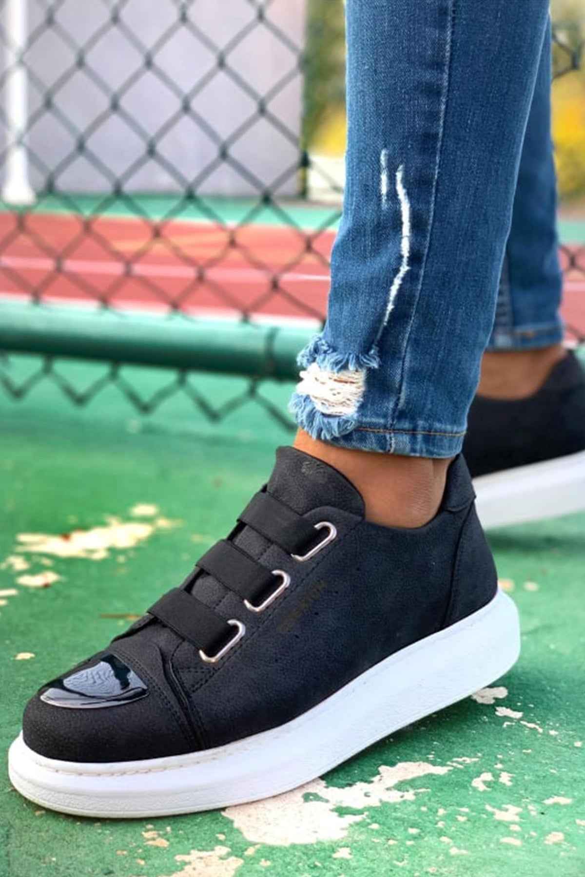Black men's sneakers with hook-and-loop straps and white rubber sole