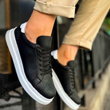 Men's black lace-up sneakers with white sole, shown in angled close-up