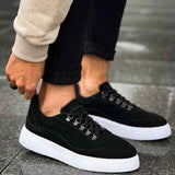 Men's black suede lace-up sneakers with white rubber sole, side view