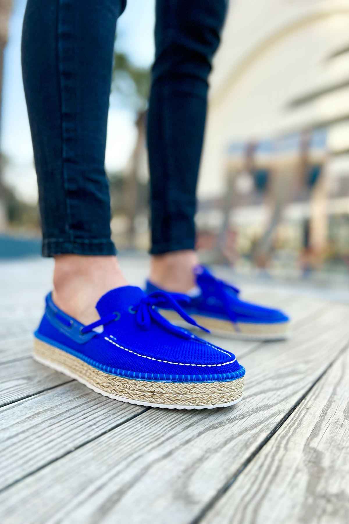 Blue men's espadrille boat shoes with lace-up front and jute-wrapped sole